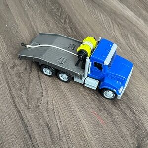 Blue and Yellow Driven Flatbed Toy Truck